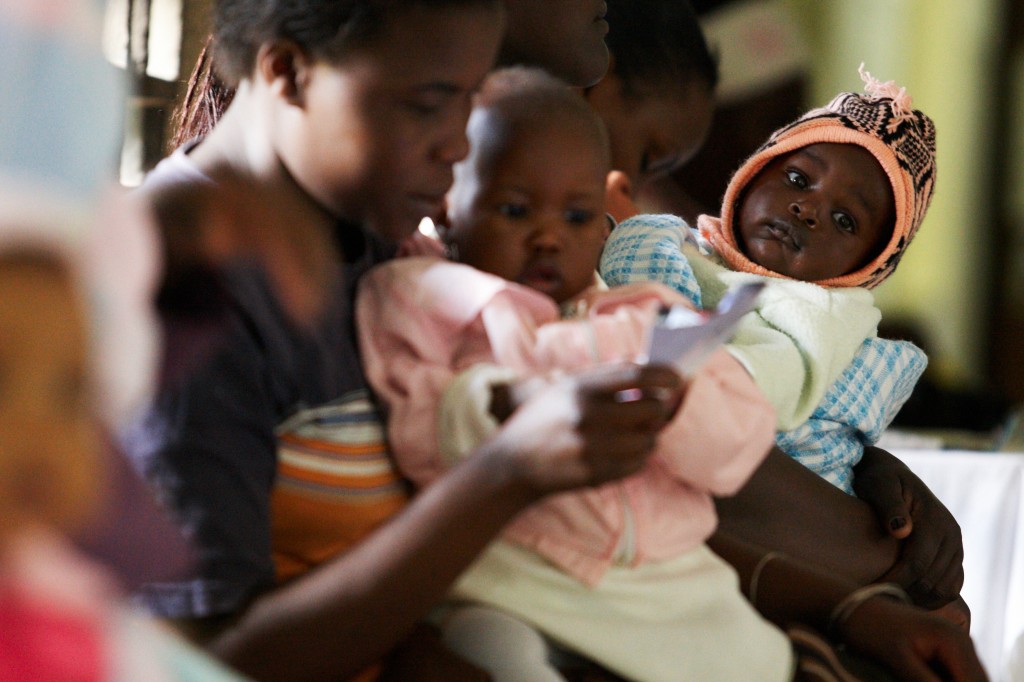 Mothers wait with their children at a health centre in Kenya. Photo: Morgana Wingard/ONE