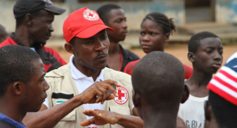 Sierra Leone Red Cross teams visit communities in the eastern district of Kailahun, to try and teach people how to protect themselves. Many communities remain in denial about the existence of the deadly virus. Photo: Katherine Mueller, IFRC