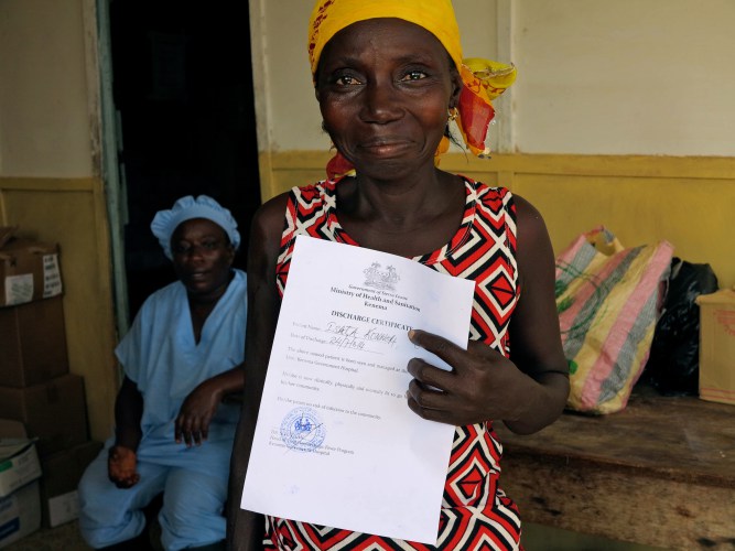 Isata Konneh from Guinea is an Ebola survivor. She shows off her certificate of good health. © UNICEF Sierra Leone/2014/Dunlop