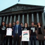 Pierre Moscovici, European Commissioner for Economic Affairs, signs the ONE VOTE 2014 pledge with French Youth Ambassadors.  Photo: ONE