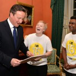 UK Prime Minister David Cameron met with two of Britain’s leading youth activists, Katie Knight and Bhavi Elangeswaran, both 15, at 10 Downing Street.  They handed him a letter to all world leaders from high profile activists including Malala, Bono and Desmond Tutu.  Photo: Save the Children / action/2015.