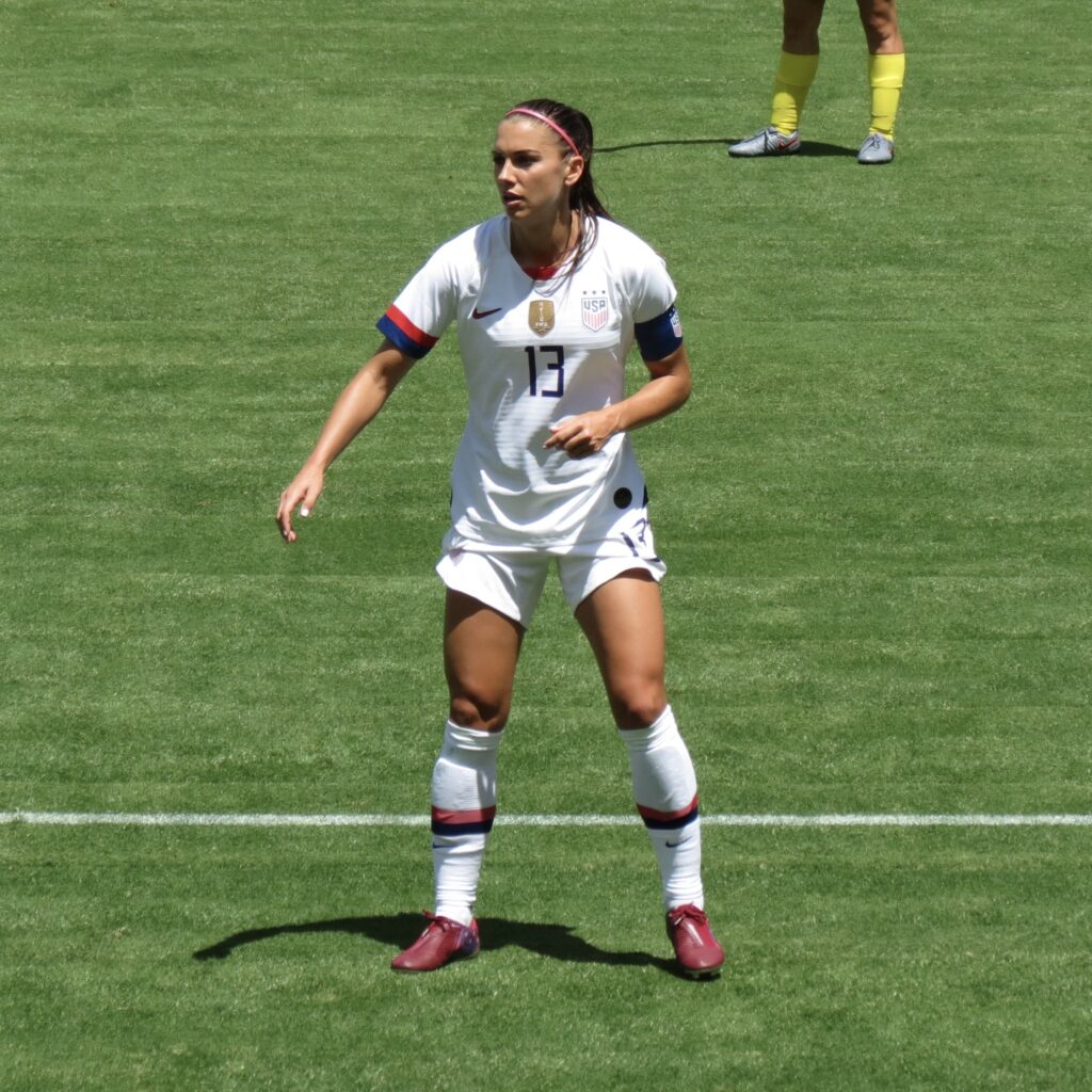 US soccer player Alex Morgan on the soccer field. 