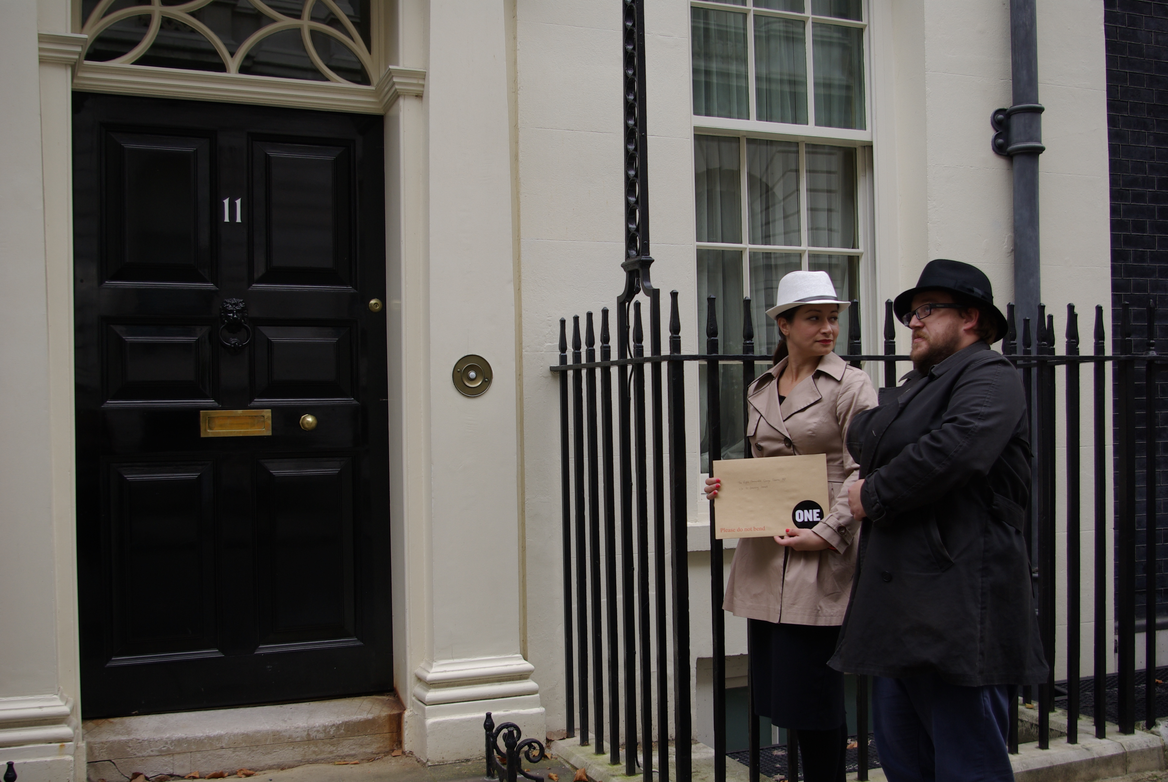 Caught on camera – shady couple deliver mystery package to George Osborne’s house