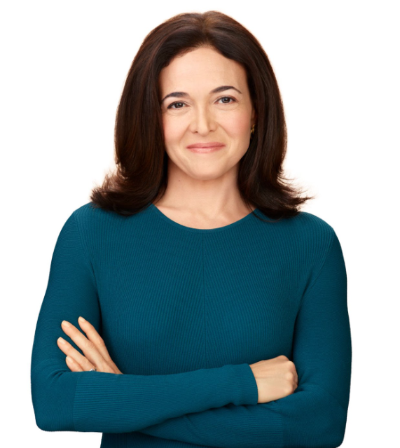portrait of Sheryl Sandberg with arms crossed against a white background