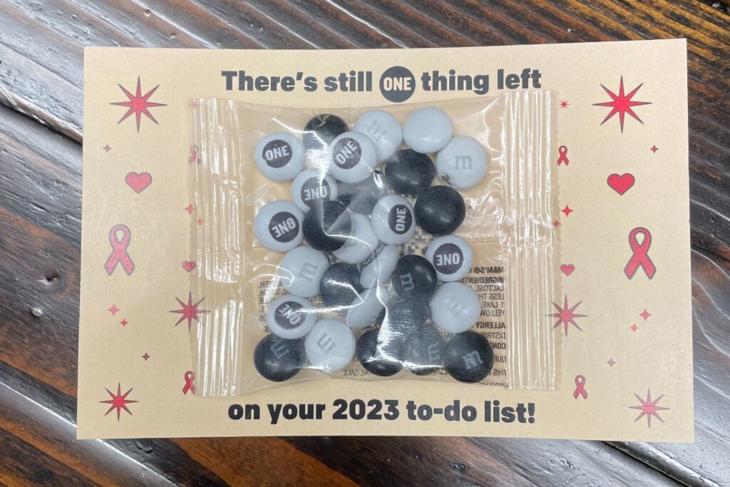 A card sent by ONE activists to Congress asking them to reauthorize PEPFAR. The card features a bag of ONE-themed M&Ms. 