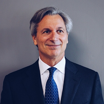 headshot of David Giampaolo against dark grey background