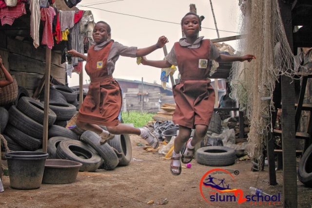 Slum2School students play in their community.