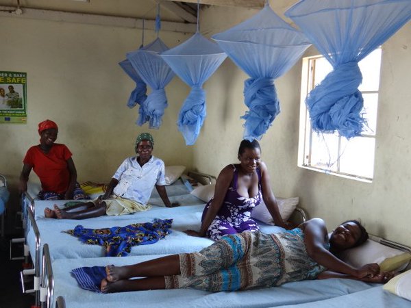 Pregnant women rest in a maternity waiting home in Zimbabwe's Mashonaland province.