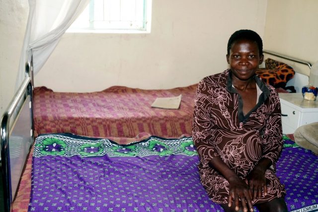 An expectant mother sits at the maternity waiting home in Mashonaland province.